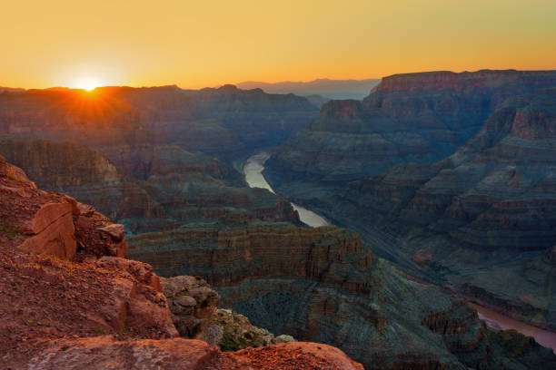 istock Grand Canyon Cliffside Sunset View with Snaking River 2154166244