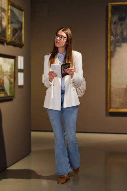 istock Woman Visiting Art Gallery Lifestyle Concept. 2154166723