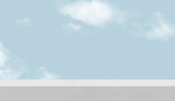 Sky Blue,Cloud with White Cement Wall Corner Design Background.Exterior building structure grey wall against clear sky,Backdrop Grey Concrete texture mock up for product present