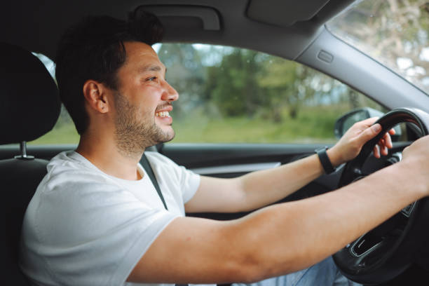 istock Driver man is driving and enjoy travel 2154167770