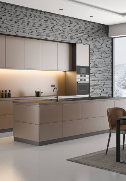 Modern home interior with white walls and a parquet on the floor. Modern black kitchen and large cupboards. Landscape. Nobody inside