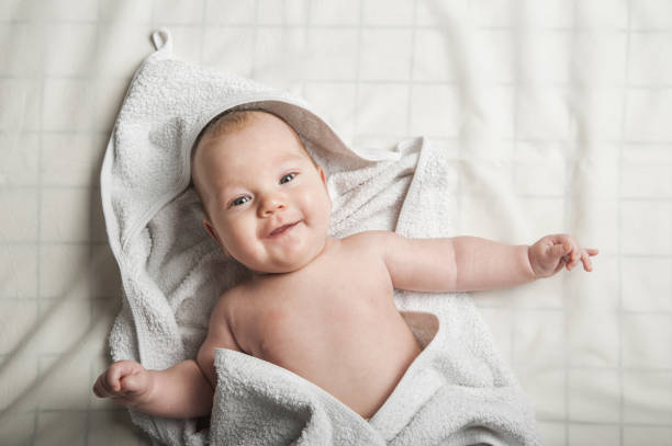 istock Newborn baby 2 months in a towel. 2154168912