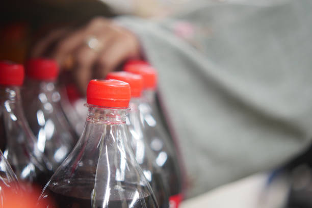 istock plastic bottles of soft drink in a shelf 2154170343