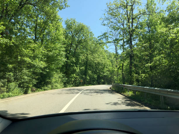 istock Traveling by car from the driver's perspective on a sunny day 2154170979