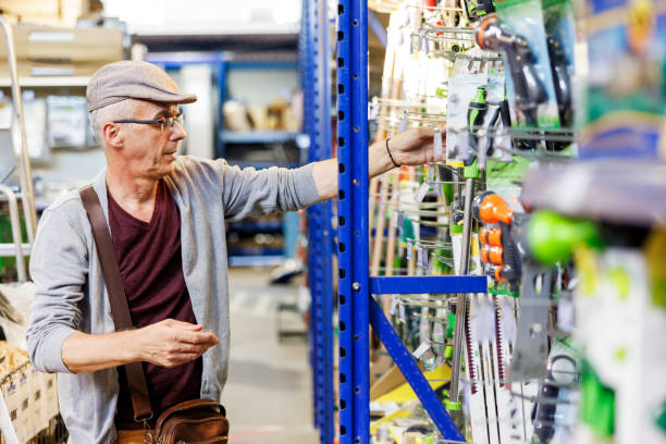 istock Mature man choosing gardening equipment 2154172586
