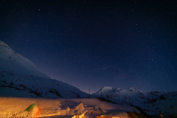 istock Night blue sky in spring evening with snow and star lights 2154174033