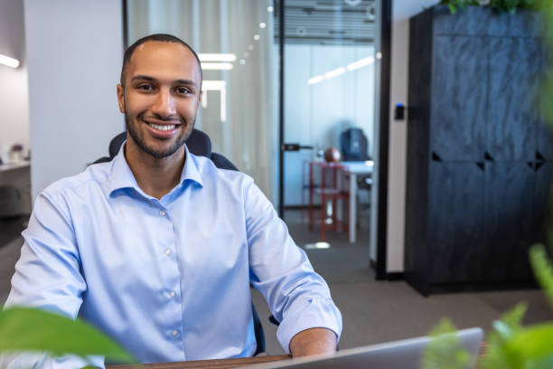 istock Businessman working on laptop doing data analysis in modern office 2154180642