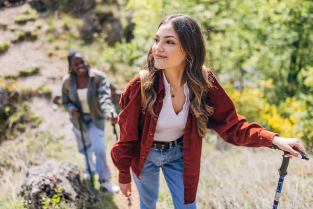istock Diverse friends enjoying a scenic mountain hike 2154181700