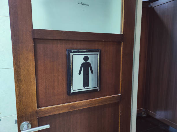 istock men's toilet in a building 2154182619