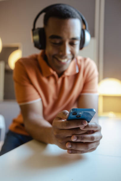 istock Surfing the Net on smart phone at home 2154184592