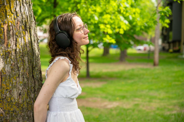 istock Young woman with headphones 2154186394