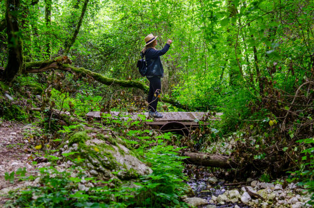 istock Woman in the stream 2154190373