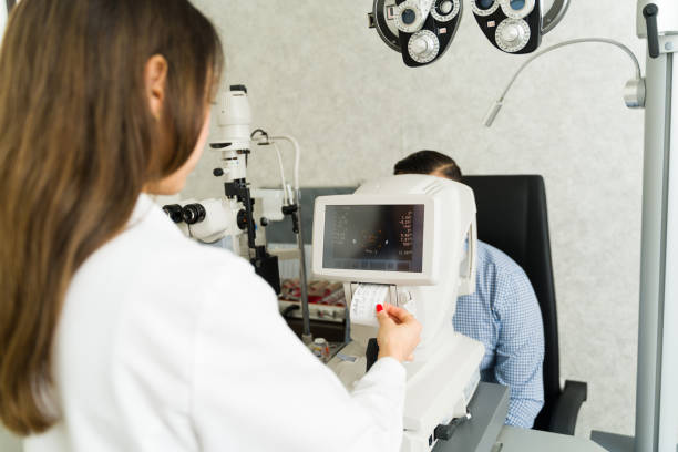 istock Male patient receives thorough vision assessment from ophthalmologist in clinic using specialized diagnostic equipment 2154195184