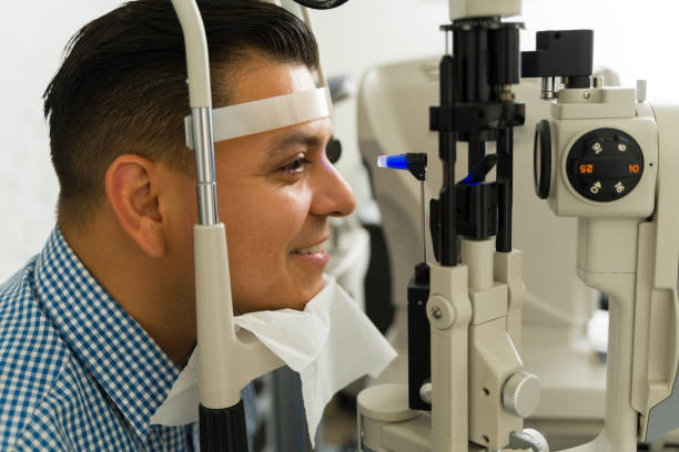 istock Patient undergoing an eye check-up with a professional ophthalmologist using special diagnostic equipment in a medical clinic 2154195410