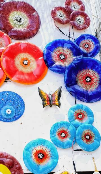 istock gift shop, colored glass plates,  blue beads, evil eye beads 2154197931