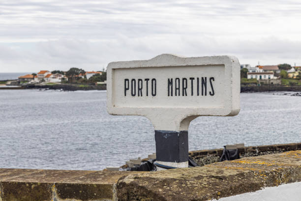 istock Sign at the Harbor in Porto Martins. 2154199597
