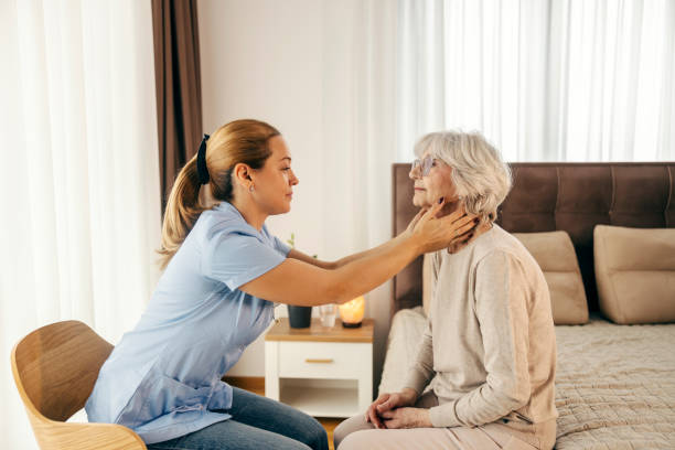 istock A doctor is doing checkups at home visit to a senior woman. 2154201678