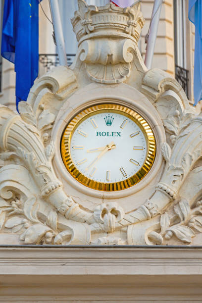 Cannes, France - February 1, 2016: Golden Rolex Watch at Luxury Hotel Carlton Entrance.