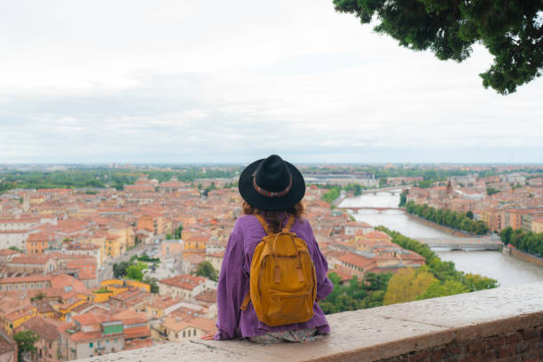 istock Woman looking at Verona from viewpoint 2154203475