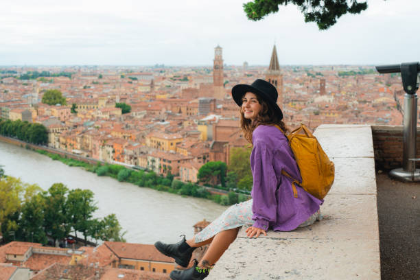 istock Woman looking at Verona from viewpoint 2154203563