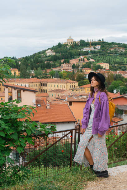 istock Woman looking at Verona from viewpoint 2154204322