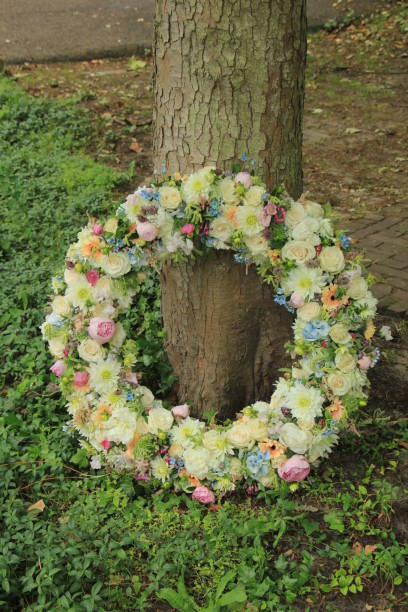 Beautiful wreath of olive and hops flower and Cork ribbon