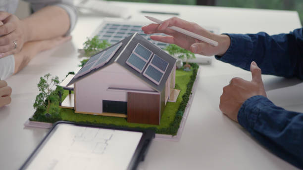 istock Planning and Discussing Solar Energy Solutions for a Residential Home. 2154208618