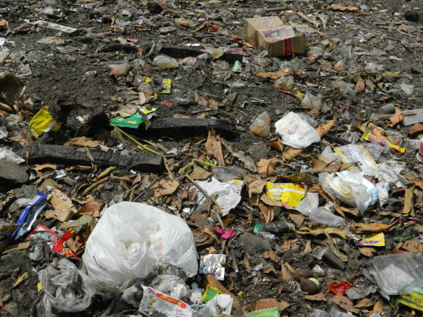 istock Open air garbage dump. Plastic pollution. Recycling junk. Consumerism 2154208787