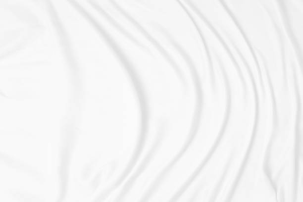 istock white cloth background soft wrinkled fabric 2154210349