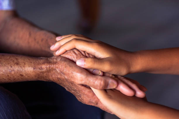 istock The Asian old woman's hand was alone. 2154210896