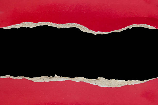 istock Red ripped paper torn edges strips isolated on black background 2154212073