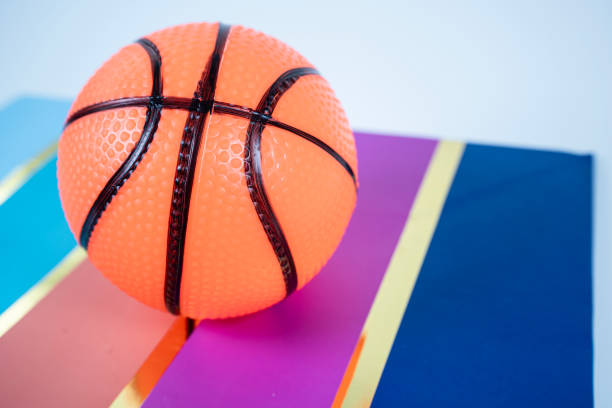 istock Basketball On A Blue And Red Table With White Background 2154218278