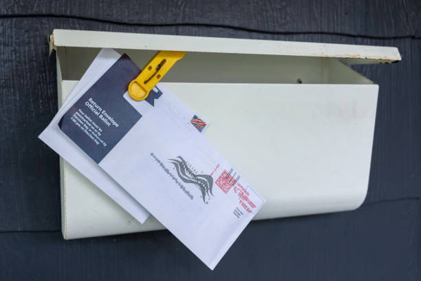 An Absentee Voting Ballot Envelope in Mailbox Waiting to be Picked Up
