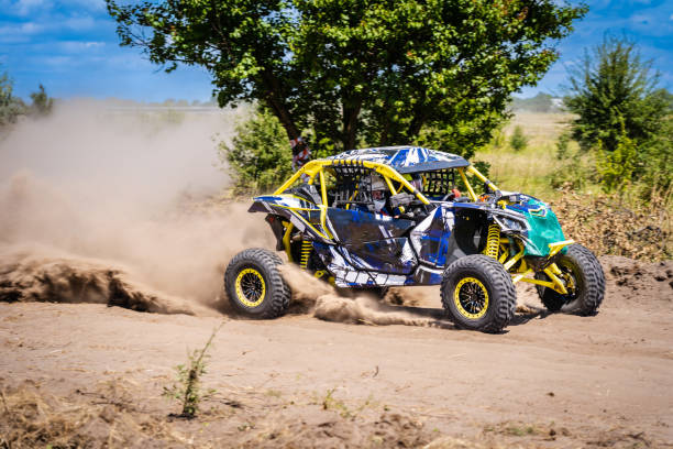 istock UTV kicking up sand on a dune. Extreme. 4x4. 2154220008