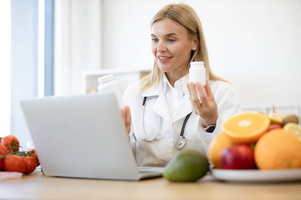 istock Caucasian doctor distantly describes the treatment plan. 2154220310