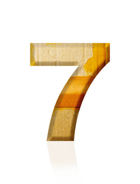 istock Isolated shot of three-dimensional old cardboard number 7 on white background 2154221434