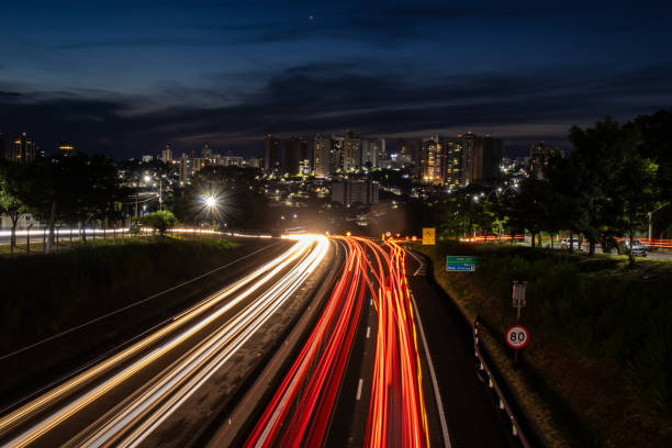 istock Trail of light caused by vehicular traffic 2154222164