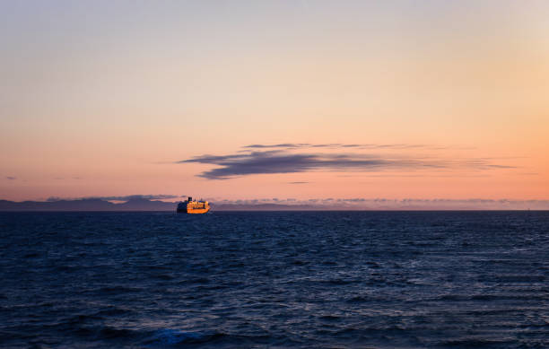 istock A cruise ship sailing at sunset. Alaska. USA. 2154222614