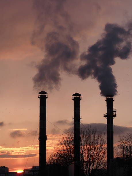 istock smoke from factory chimneys against red sky 2154224144