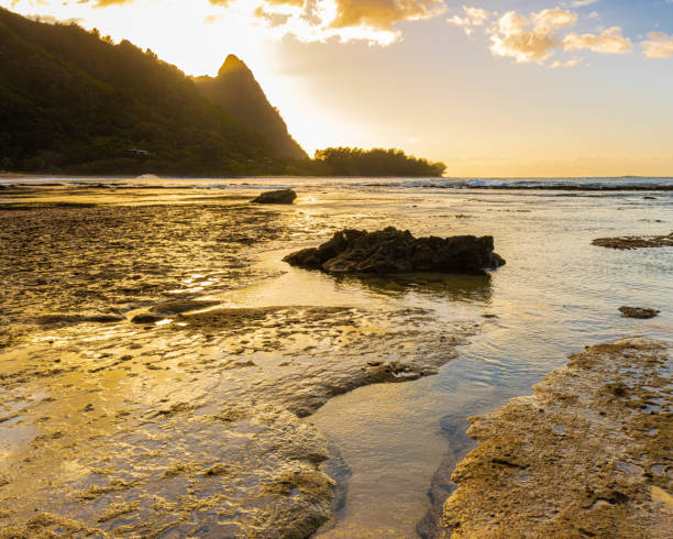istock Beautiful Sunset Reflection on The Tide Pools at Tunnels Beach 2154227572