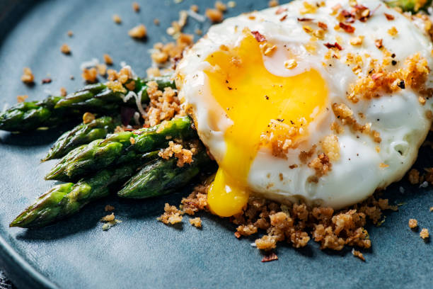 istock Pan Fried Asparagus With Fried Egg and Panko Gremolata 2154236744