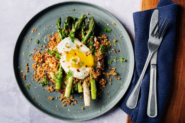 istock Pan Fried Asparagus With Fried Egg and Panko Gremolata 2154237230