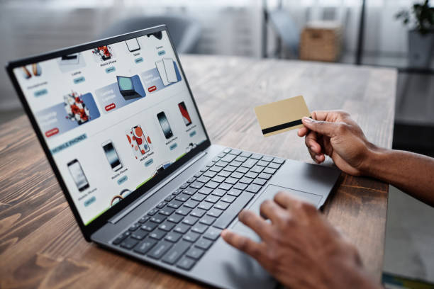 istock Unrecognizable Person Doing Online Shopping On Laptop 2154238557