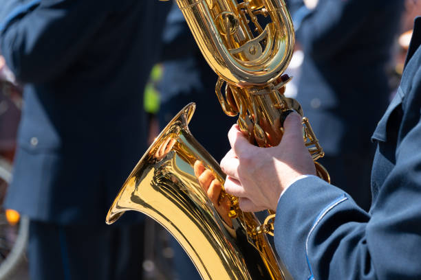 istock A man plays the saxophone, close-up. 2154239221
