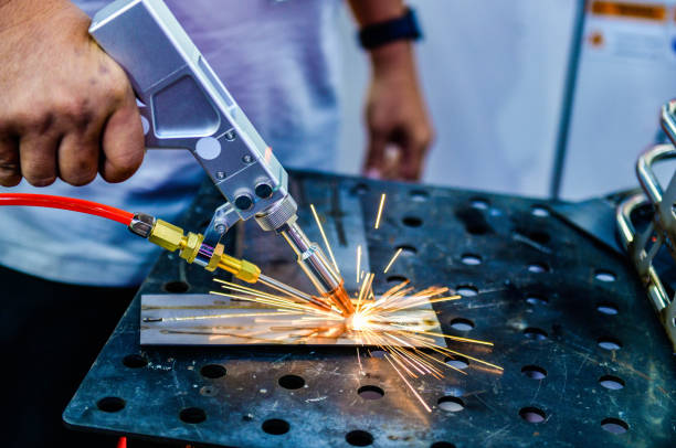 istock Industry worker welding iron pieces work at the factory 2154240647