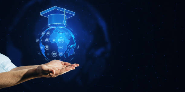 istock A hand presenting a digital hologram of a globe with icons and a graduation cap, on a network connection background, concept of global education 2154242079