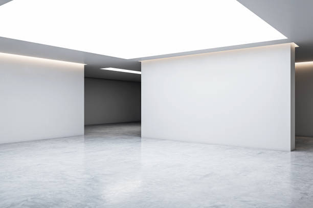 istock A clean and contemporary gallery interior with blank white walls and marble flooring, illuminated by natural and artificial light, depicting a minimalist design space. 3D Rendering 2154242099