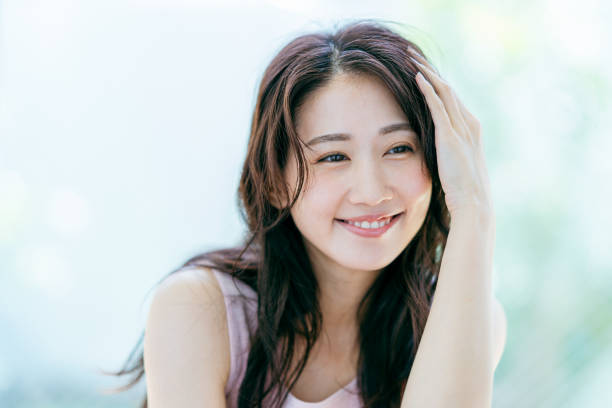 portrait of young woman - 美容 日本人 ストックフォトと画像