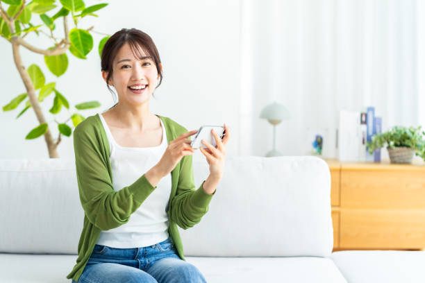 istock young woman calling on smartphone 2154243309