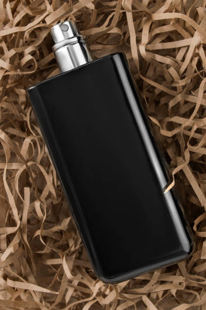 istock Perfume bottle in shred paper 2154245675